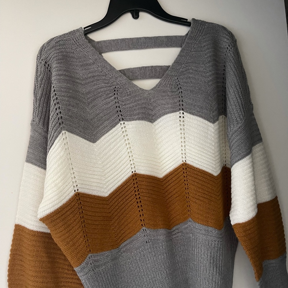 Women’s striped, ladder back sweater size L